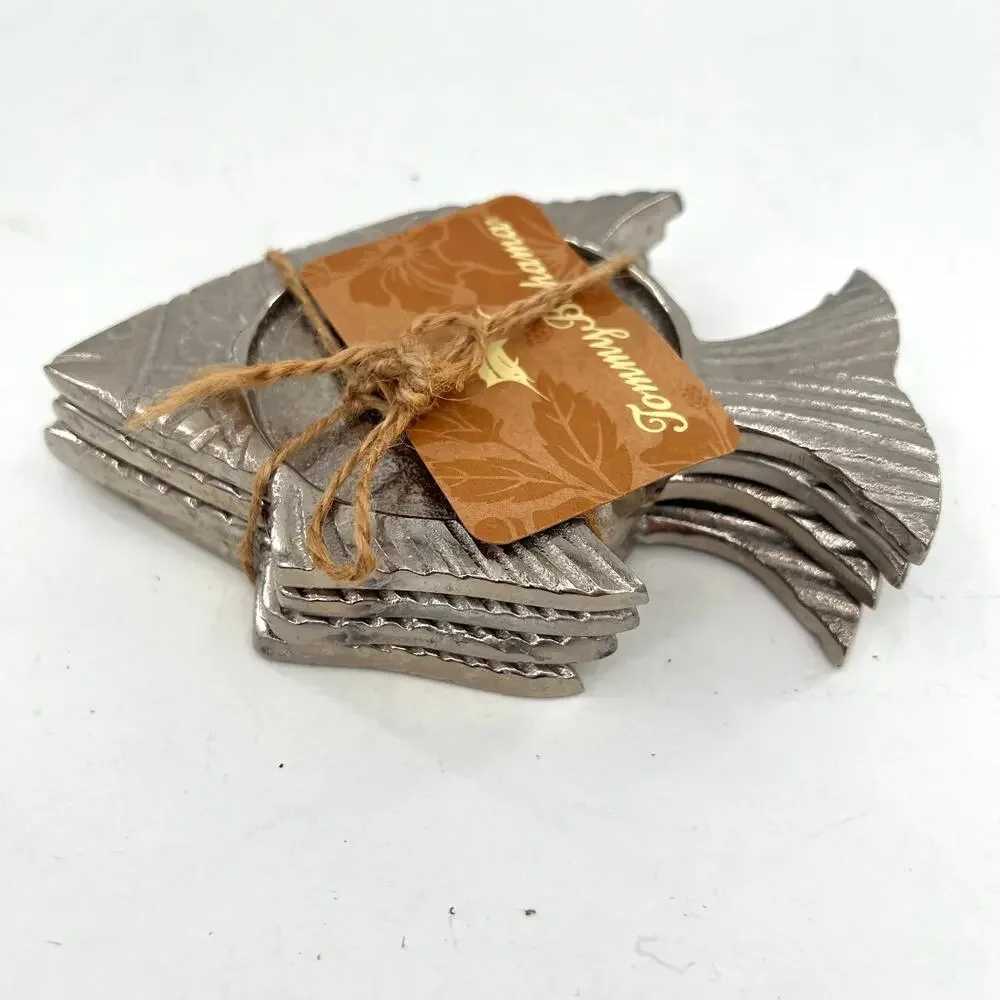 Tommy Bahama silver metal fish-shaped coaster or candle holder set.